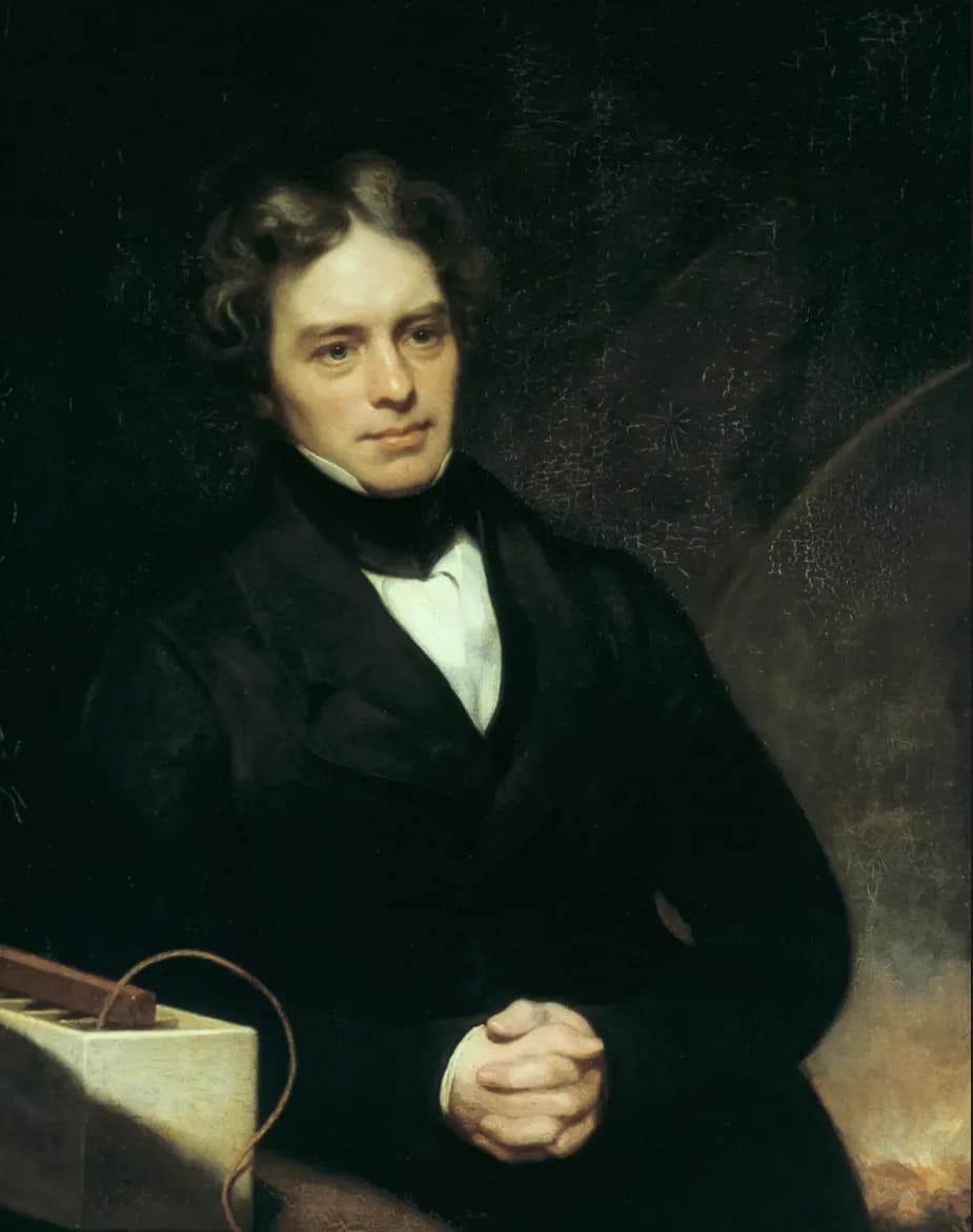 Oil painting portrait of a man in a black coat with clasped hands, seated near a wooden box with a coiled wire.