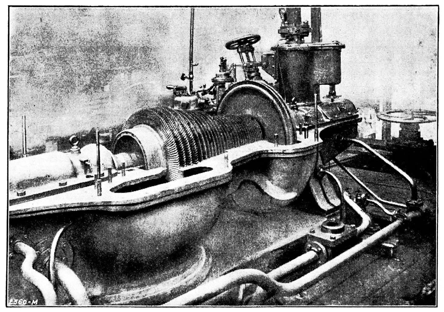 Black-and-white photograph of an industrial steam turbine generator with a cylindrical housing, valves, and connecting pipes, numbered 8360-M in the corner.